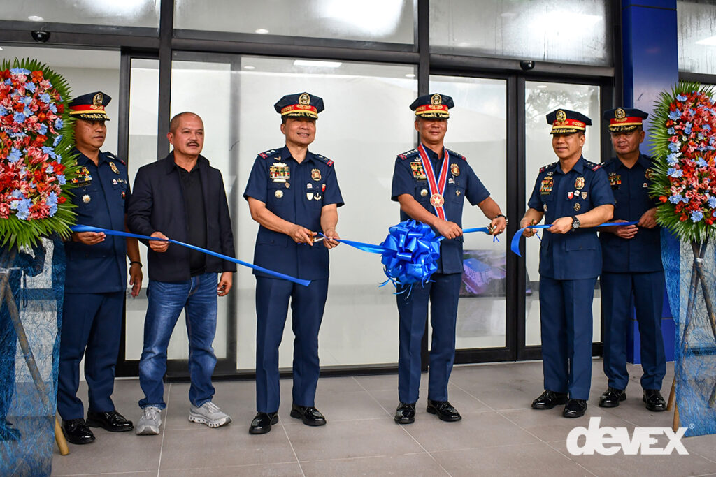 Officials participate in the ribbon-cutting ceremony during the inauguration of the new NCRPO Regional Headquarters Building at Camp Bagong Diwa, Taguig City.