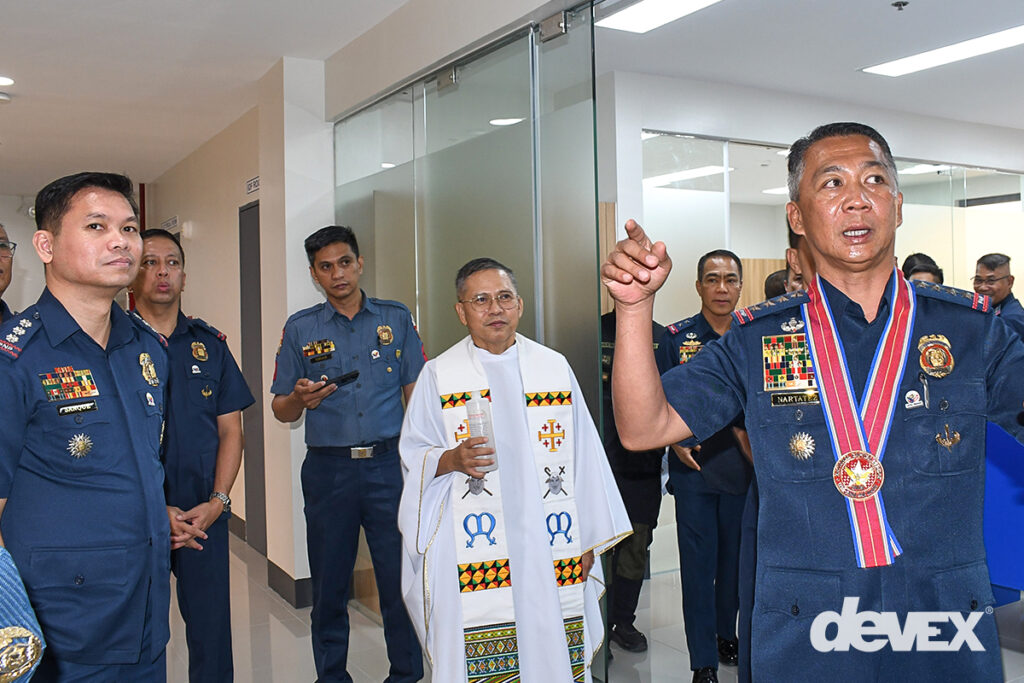 Blessing ceremony inside the new NCRPO Regional Headquarters Building at Camp Bagong Diwa, Taguig City, attended by PNP officials and personnel.