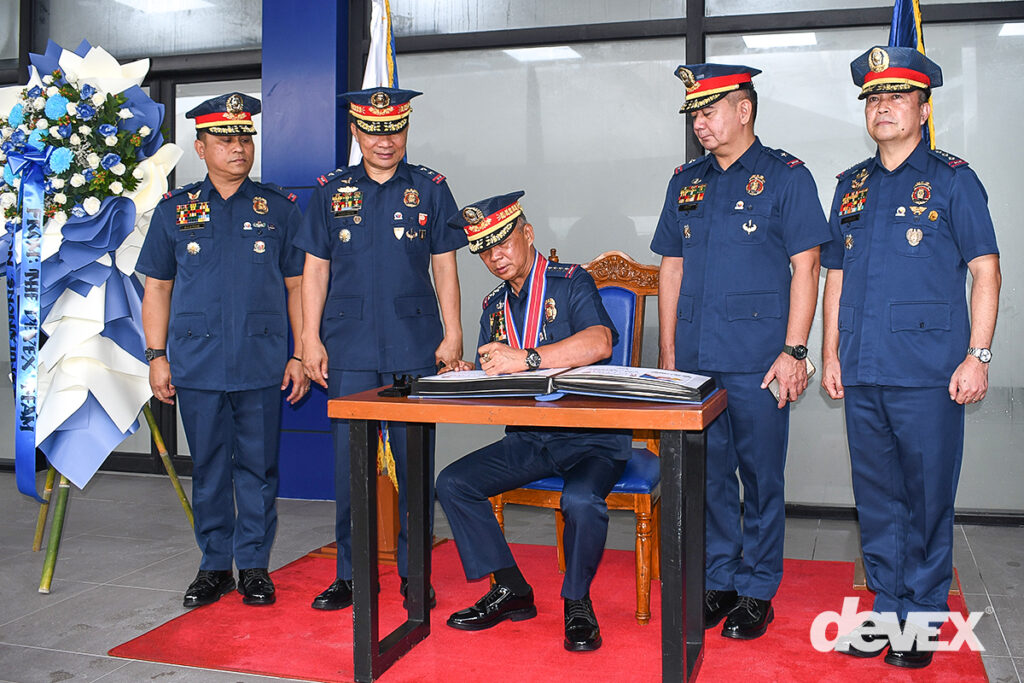 PNP official signs the commemorative guest book during the inauguration of the new NCRPO Regional Headquarters Building at Camp Bagong Diwa, Taguig City.